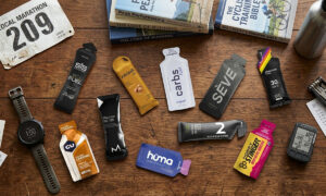Ten energy gel packets laid out flat for comparison, including Maurten, GU, Precision Fuel, and Huma