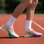 Carbon plate running shoes for beginners on a track