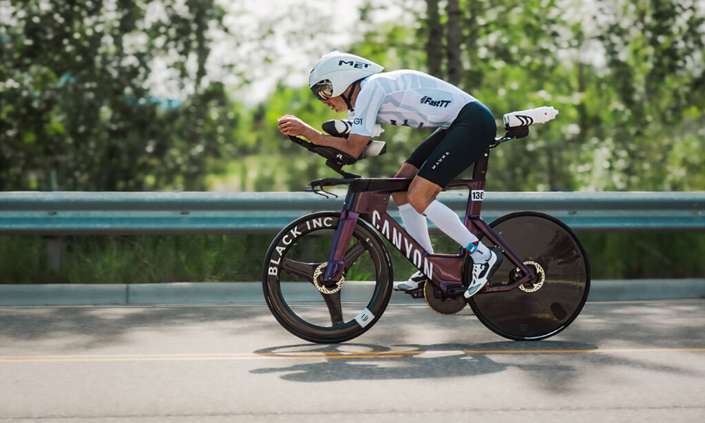triathlete during a bike leg in a triathlon