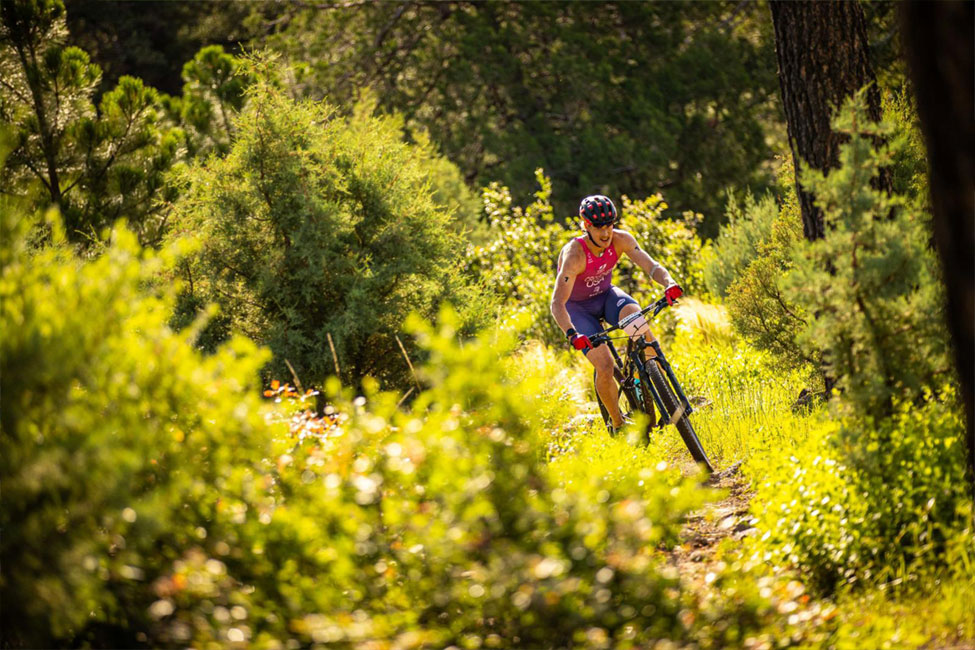 athlete in the bike course in the 2025 Xterra World Championships