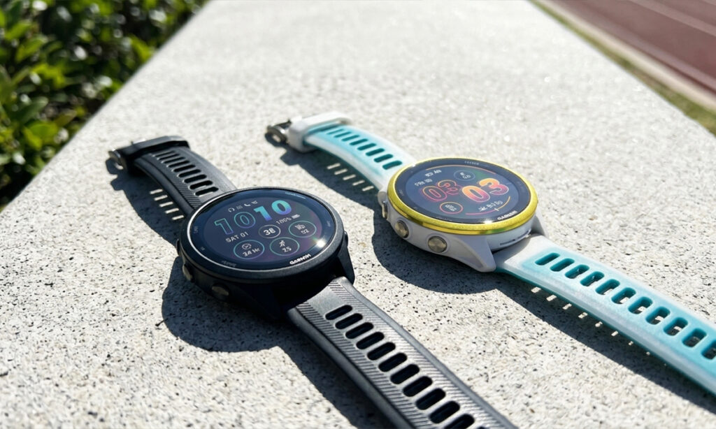 Garmin Forerunner 265 next to a newer forerunner 570